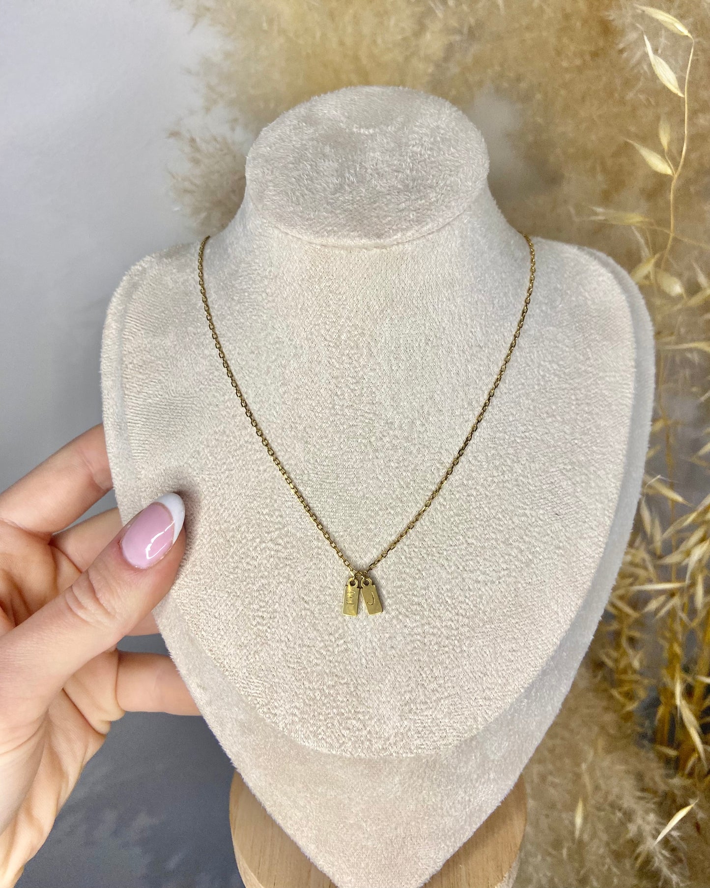 Collier estampillé avec pampilles