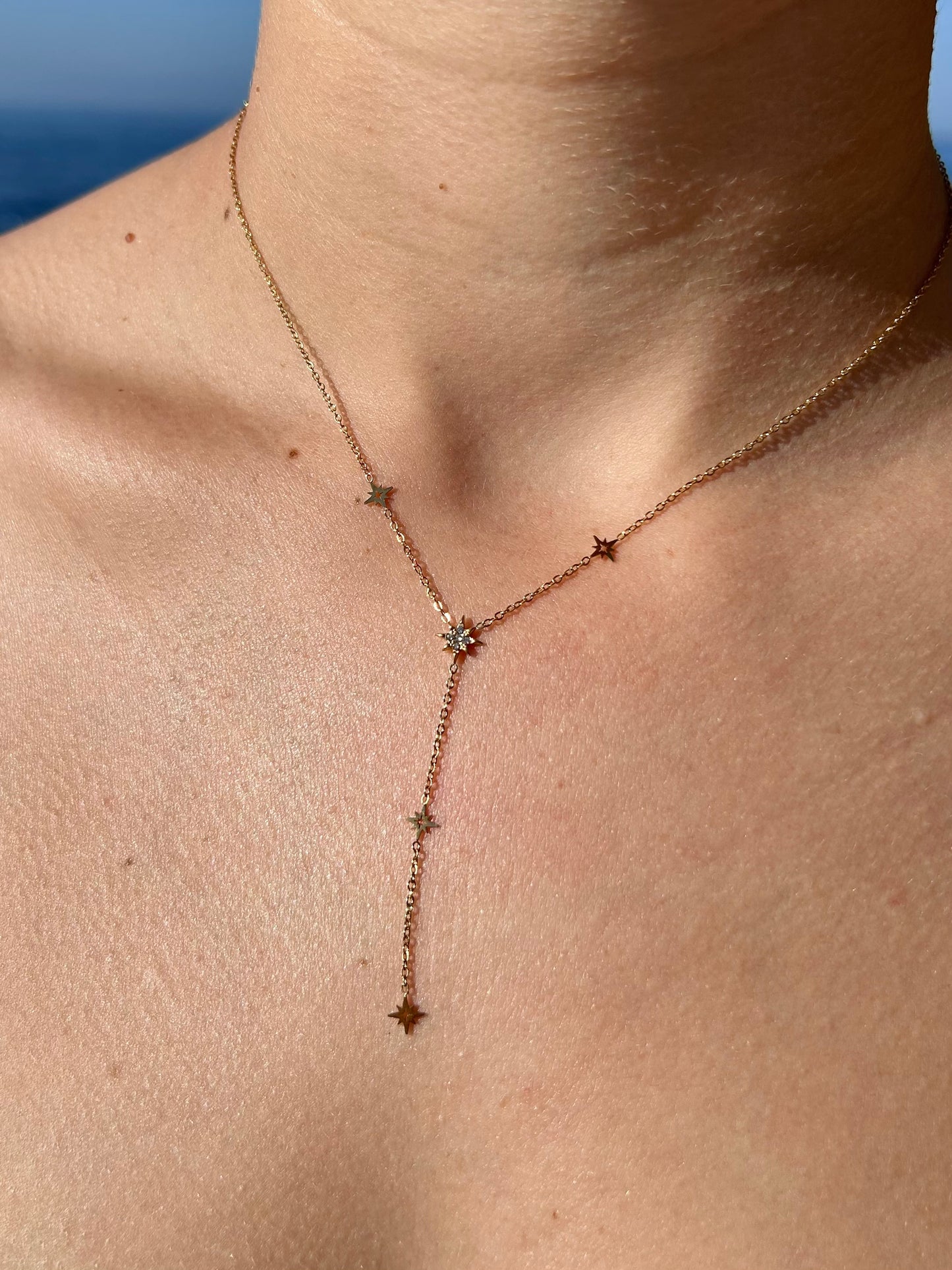 Collier y avec étoile